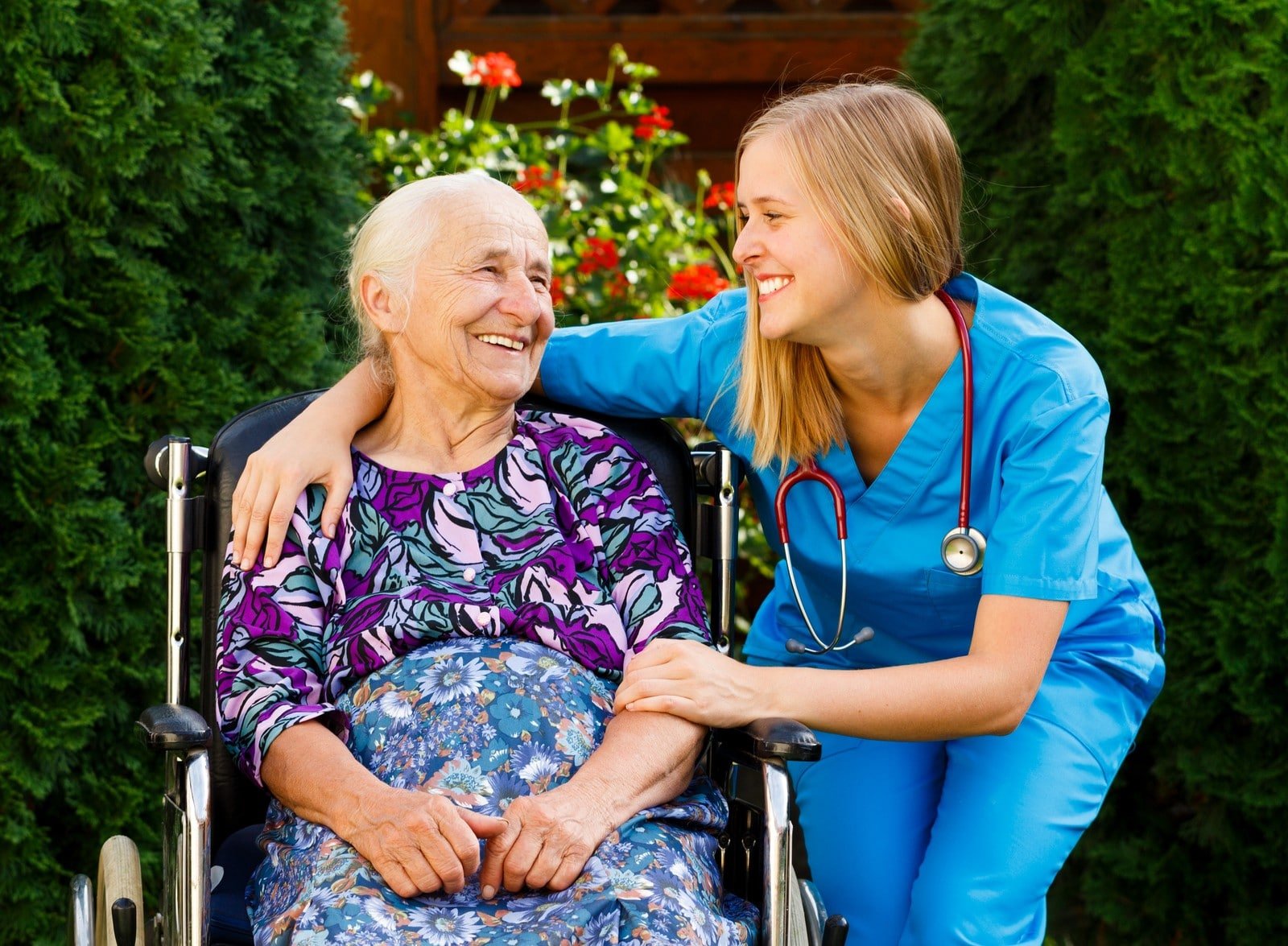 Supporting young healthcare worker with elderly patient